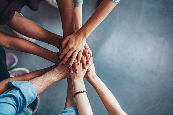 Hands Together Working As One Shutterstock 506137132 (1)